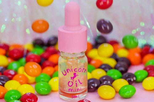 Skittles scented cuticle oil mini dropper with colourful candy scatter, lightweight nail serum for cuticle care