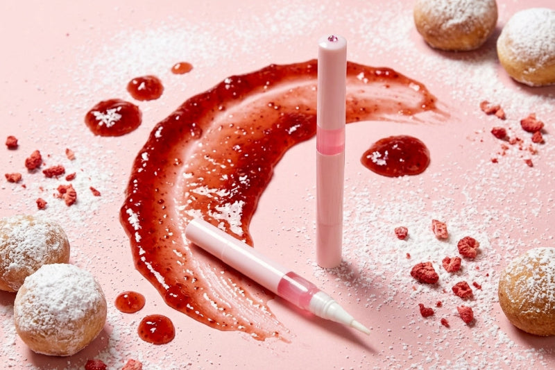 Jam Donut Unicorn Cuticle Oil - Unicorn Lab nail serum surrounded by jam 