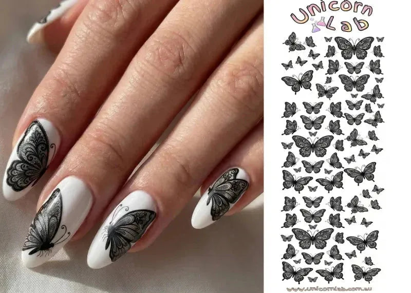 Nails with black butterfly design and a sheet of butterfly stickers on the side, branded 'Unicorn Lab'.
