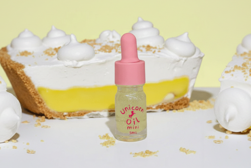 Lemon Meringue Unicorn Cuticle Oil - also available in wholesale and bulk in front of a lemon meringue pie
