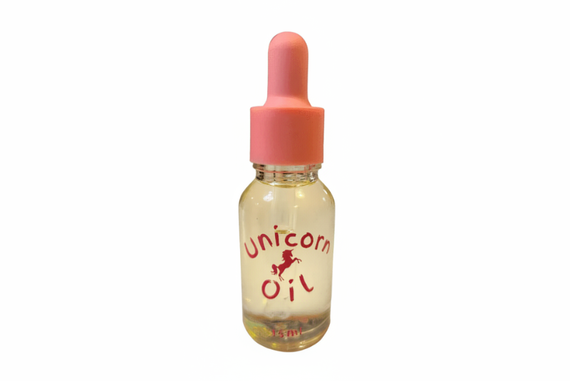 15ml glass dropper bottle of organic, unscented Naked Unicorn Cuticle Oil against a clean white background.