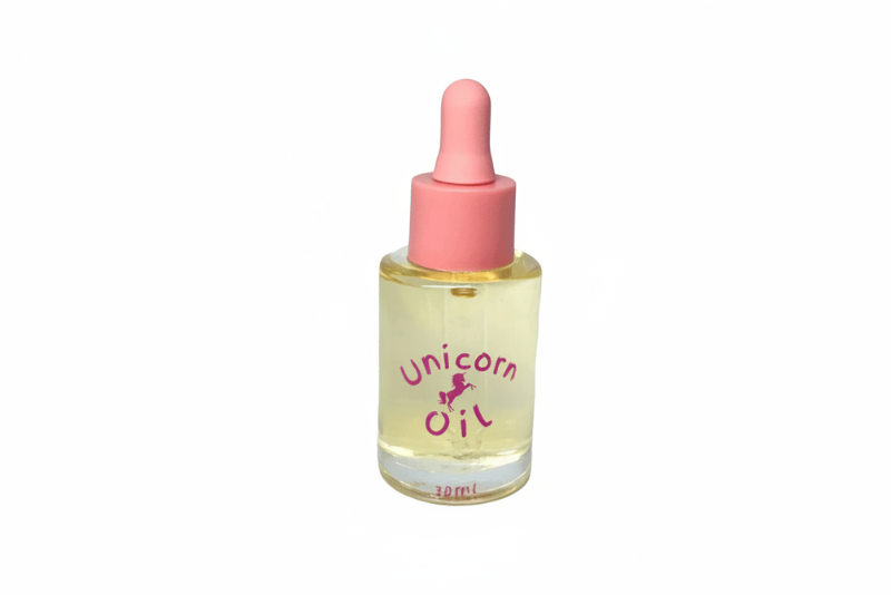 30ml glass dropper bottle of organic, unscented Naked Unicorn Cuticle Oil against a clean white background.