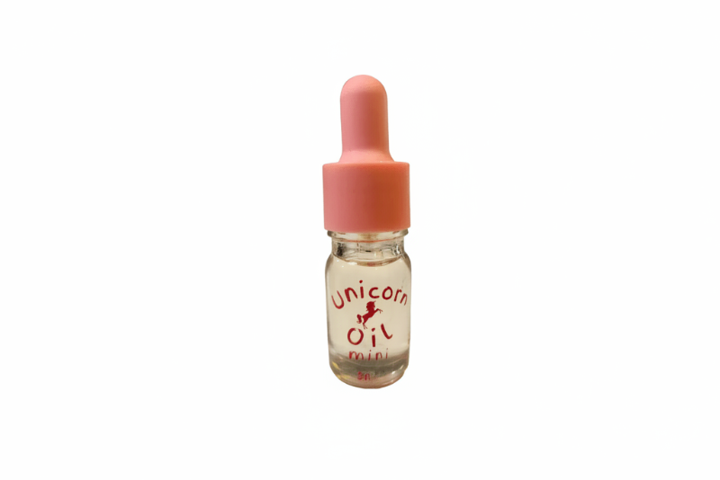 5ml glass dropper bottle of organic, unscented nail care cuticle oil against a clean white background.