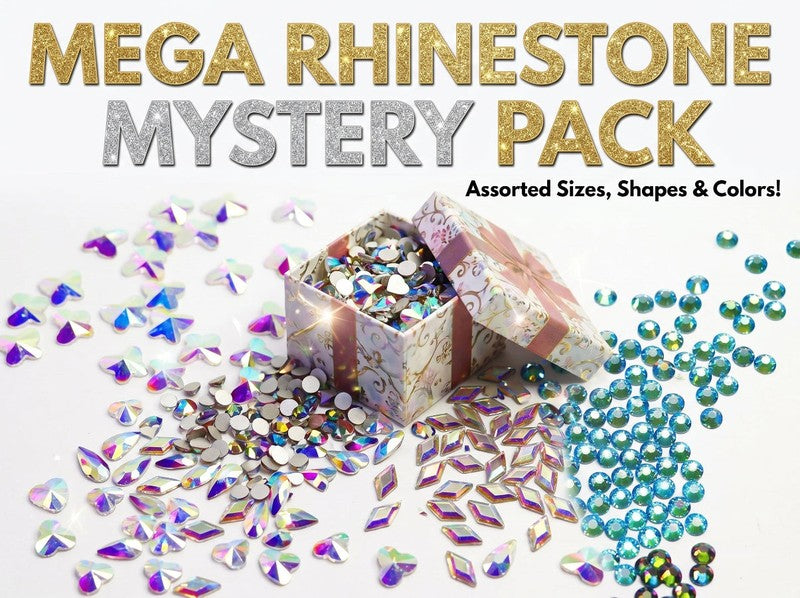 Mega rhinestone mystery pack with assorted sizes, shapes, and colors on a white background.