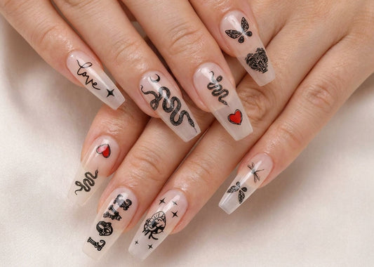 Nails with artistic snake designs on a light background