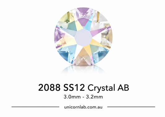 Crystal AB gemstone with specifications on a white background.Genuine Swarovski SS12 Crystal AB flatback nail crystals