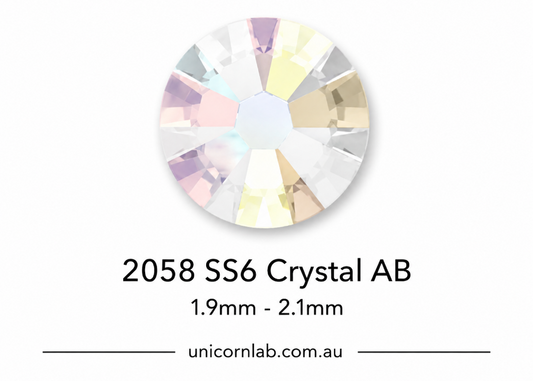 Crystal AB gemstone with size 2058 SS6 on a white background, featuring the brand 'unicornlab.com.au'. SS6 Crystal AB Flatback Nail Crystals | Genuine 2058 Rhinestones