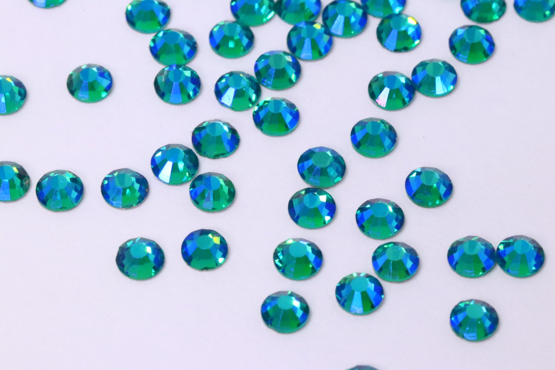 Blue Zircon AB SS10 (Unicorn Lab Rhinestones) nail crystals The original Shimmer Cuticle Oil – Handcrafted in Melbourne since 2017 – First cuticle oil droppers to hit the Australian market