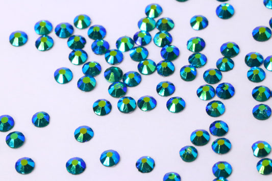 Blue Zircon AB SS6 (Unicorn Lab Rhinestones) nail crystals The original Shimmer Cuticle Oil – Handcrafted in Melbourne since 2017 – First cuticle oil droppers to hit the Australian market