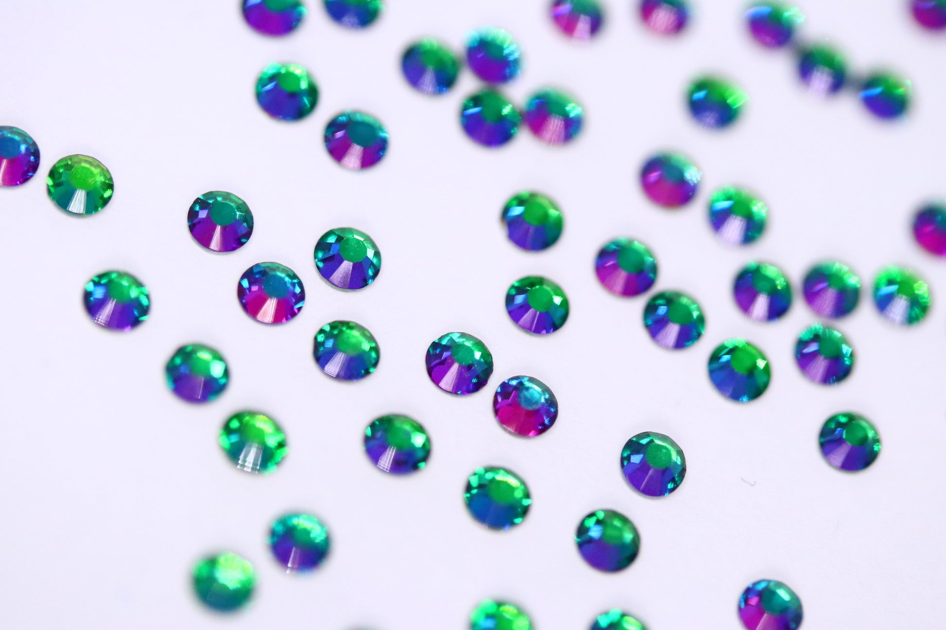 Green Volcano SS10 (Unicorn Lab Rhinestones) nail crystals The original Shimmer Cuticle Oil – Handcrafted in Melbourne since 2017 – First cuticle oil droppers to hit the Australian market