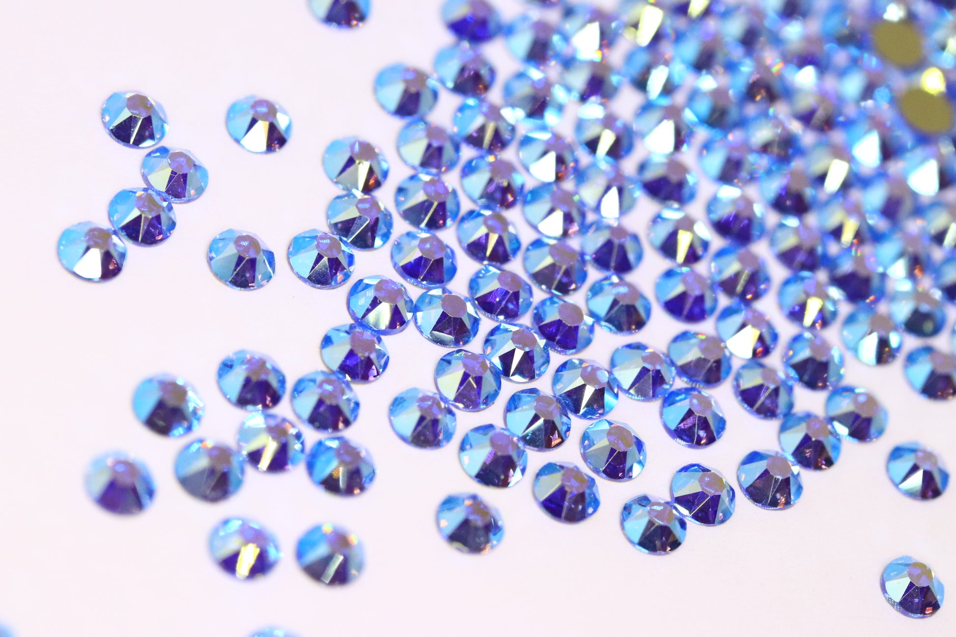 Light Sapphire AB SS16 (Unicorn Lab Rhinestones) nail crystals The original Shimmer Cuticle Oil – Handcrafted in Melbourne since 2017 – First cuticle oil droppers to hit the Australian market