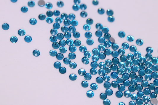 Aquamarine SS6 (Unicorn Lab Rhinestones) nail crystals The original Shimmer Cuticle Oil – Handcrafted in Melbourne since 2017 – First cuticle oil droppers to hit the Australian market