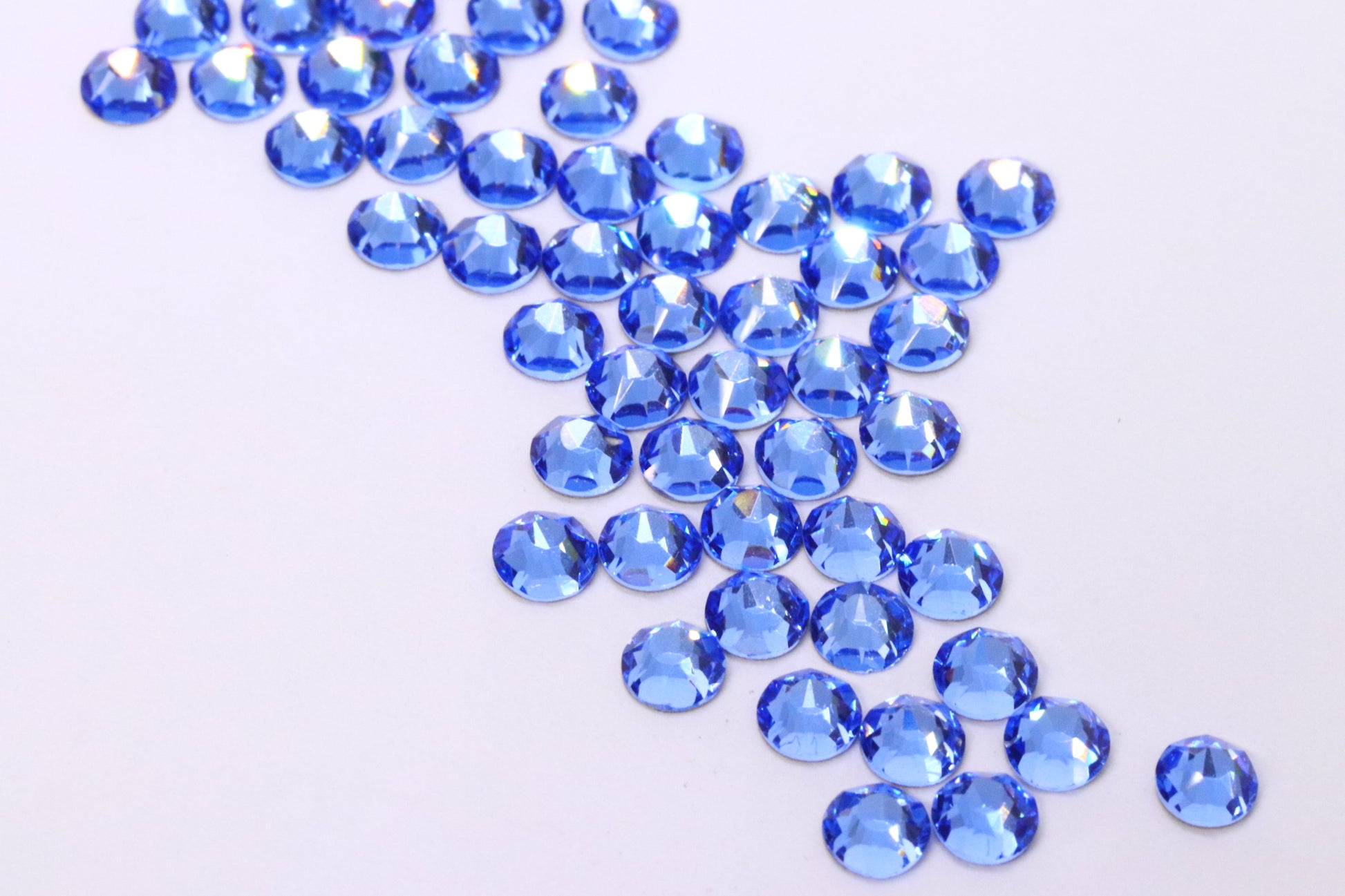 Light Sapphire SS16 (Unicorn Lab Rhinestones) nail crystals The original Shimmer Cuticle Oil – Handcrafted in Melbourne since 2017 – First cuticle oil droppers to hit the Australian market
