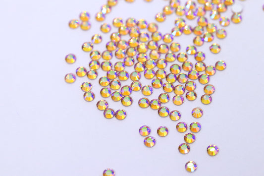 Champagne ab SS6 (Unicorn Lab Rhinestones) nail crystals The original Shimmer Cuticle Oil – Handcrafted in Melbourne since 2017 – First cuticle oil droppers to hit the Australian market