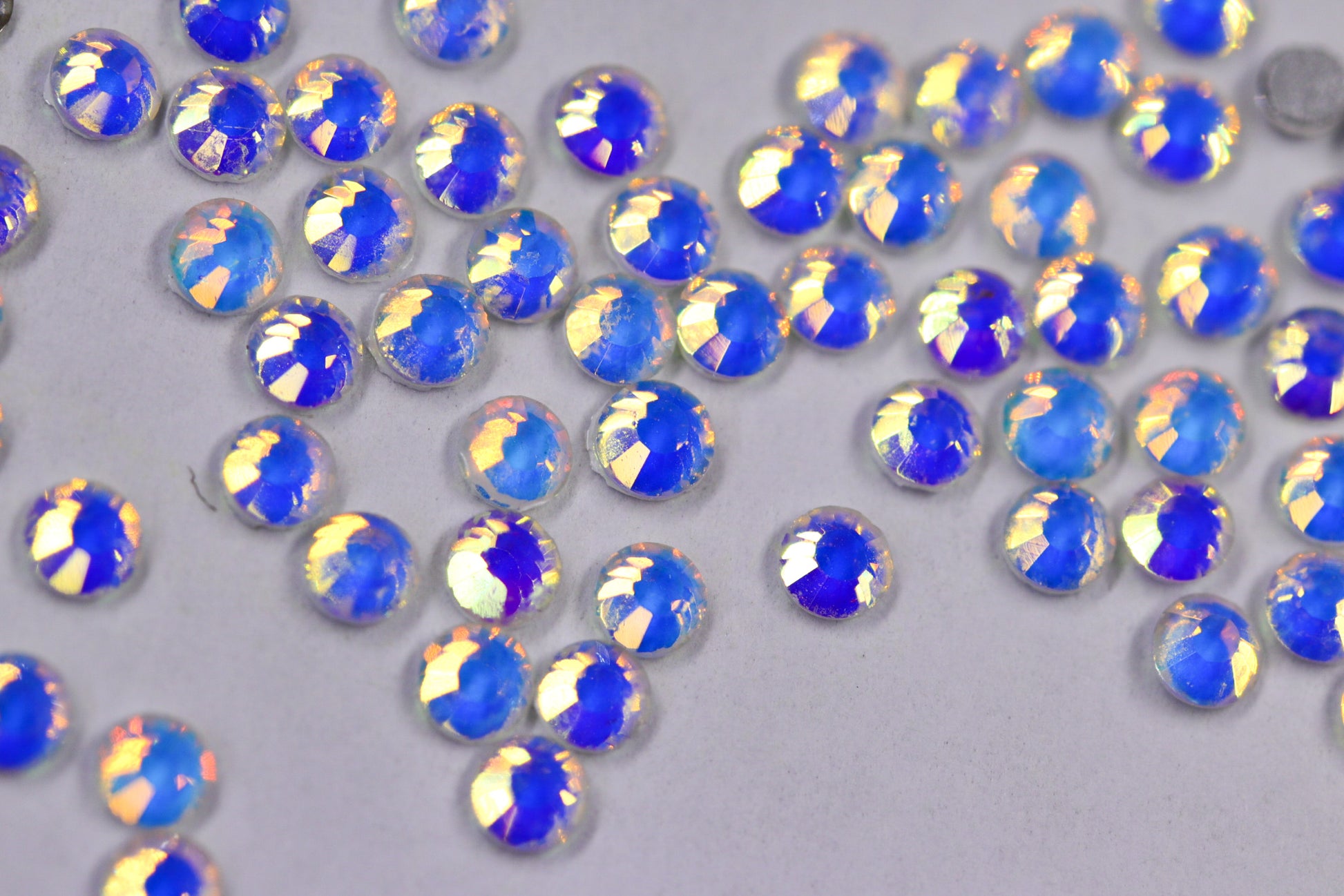 Crystal Luminous Opal SS6 (Unicorn Lab Rhinestones) nail crystals The original Shimmer Cuticle Oil – Handcrafted in Melbourne since 2017 – First cuticle oil droppers to hit the Australian market