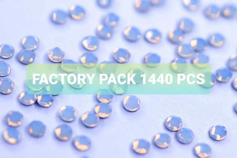 Bulk factory pack of White Opal SS4 (1.5mm) milky iridescent glass flatback rhinestones for professional nail art.