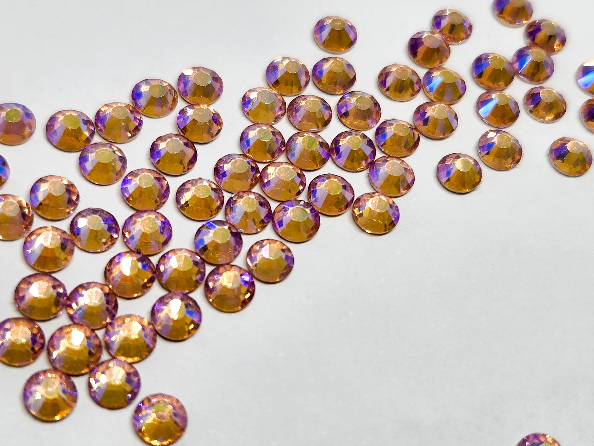 Champagne ab SS16 (Unicorn Lab Rhinestones) nail crystals The original Shimmer Cuticle Oil – Handcrafted in Melbourne since 2017 – First cuticle oil droppers to hit the Australian market