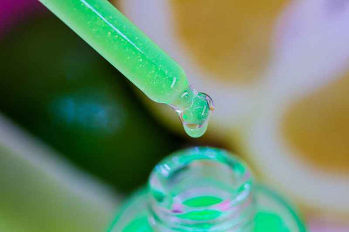 15ml green cuticle oil with tropical citrus styling, non-greasy nail serum