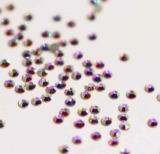 100-piece retail pack of AB SS4 (1.5mm) iridescent glass flatback rhinestones for nail art.