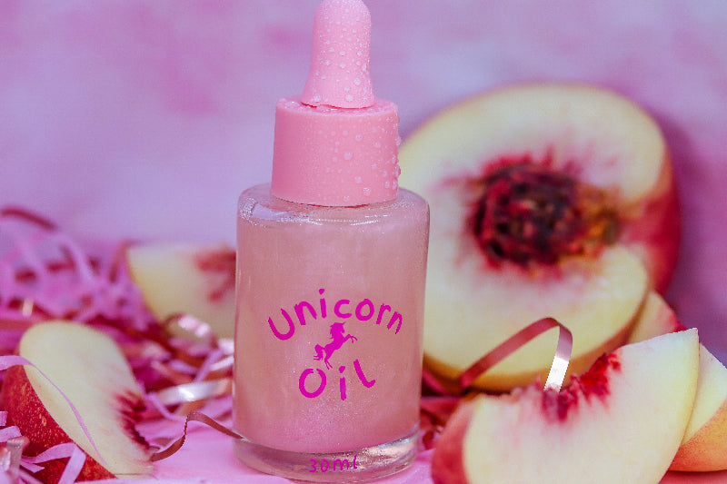 Peach scented cuticle oil large bottle with peach styling, nourishing nail serum