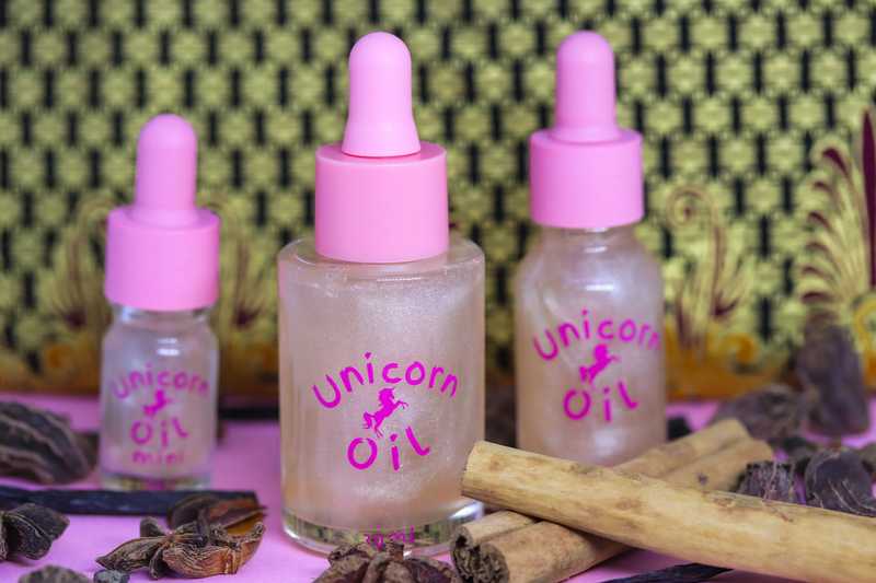 Vanilla Spice & Everything Nice Unicorn Cuticle Oil - surrounded by cinnamon sticks, vanilla and star anise